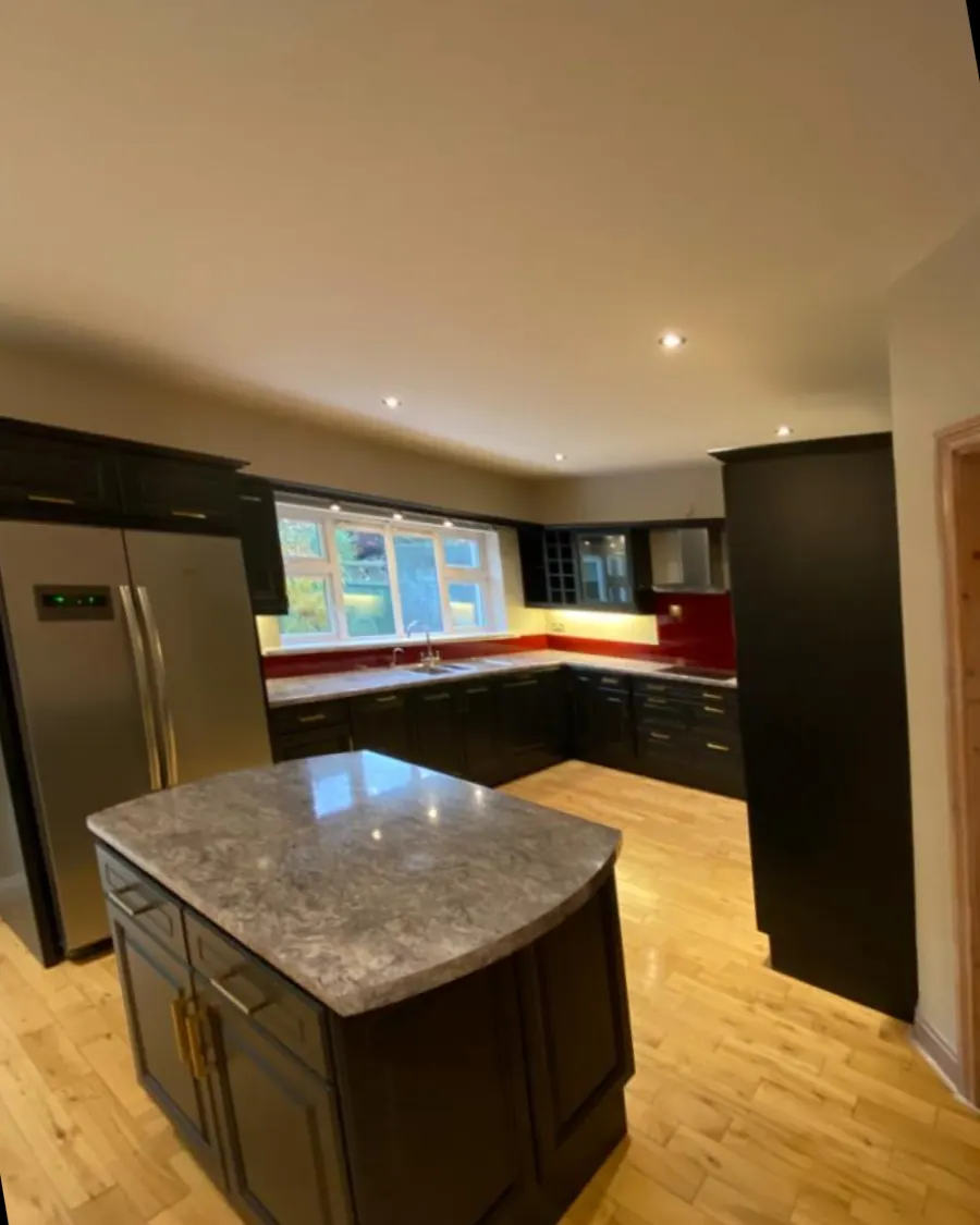 The same kitchen and island resprayed in black